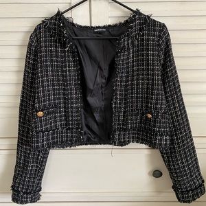 Black and white cropped jacket size Medium. Brand LoveWednesday.